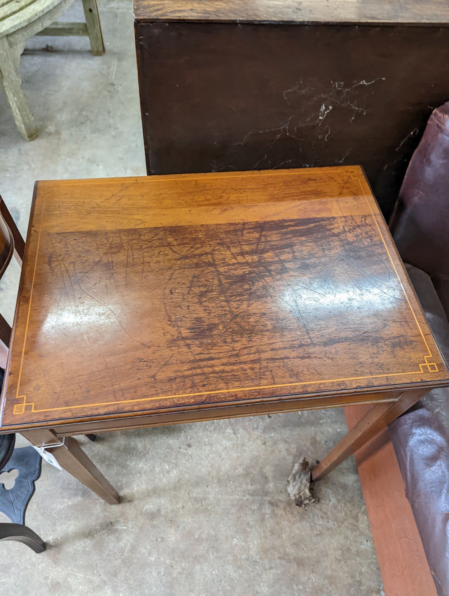 An Edwardian inlaid mahogany hinge top table, width 60cm, depth 45cm, height 77cm